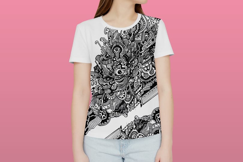 White T-shirt with a black lace-style illustration on a pink backdrop
